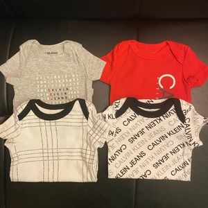 4 Calvin Klein Baby Onesies 3-6 Month